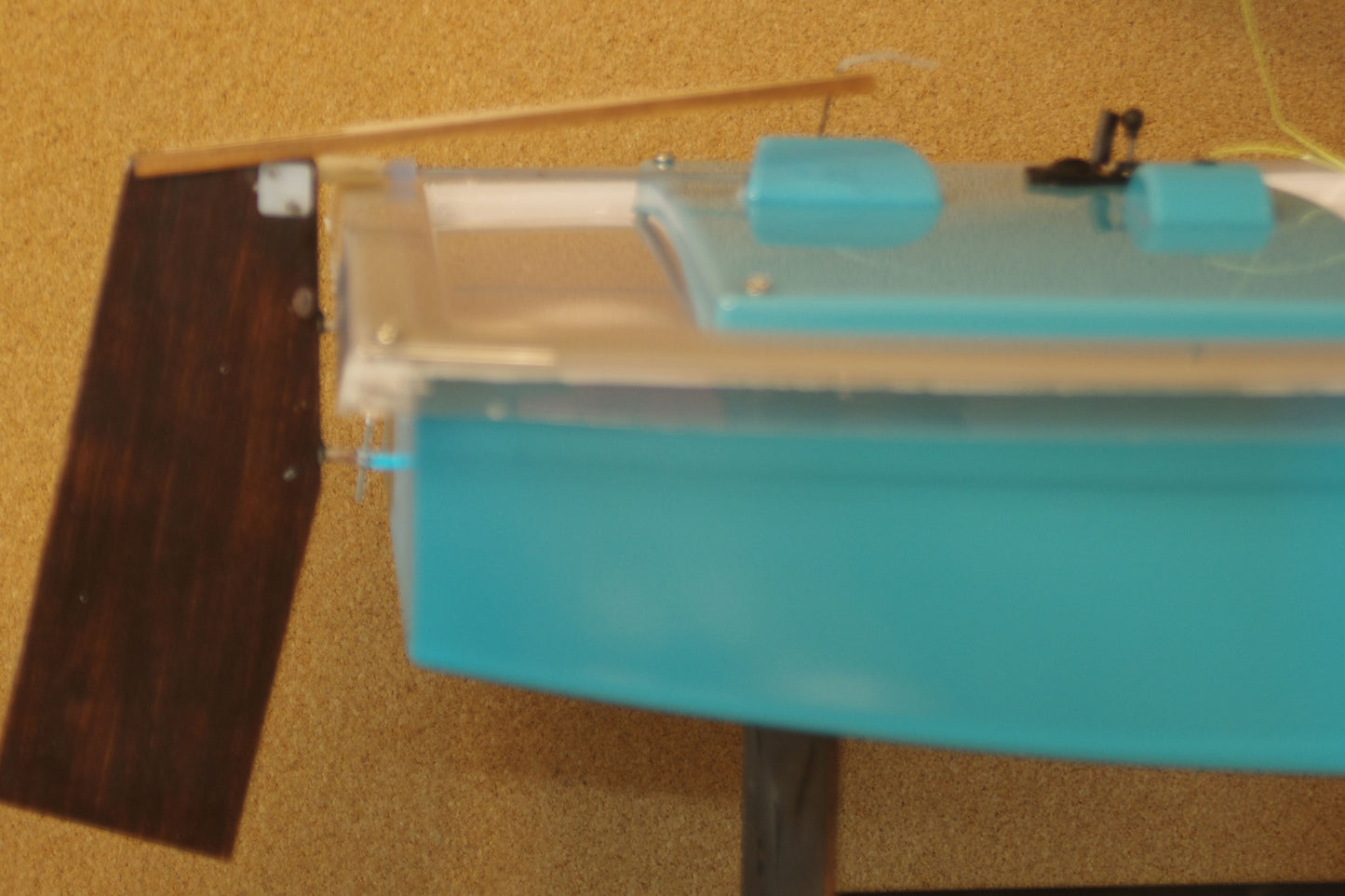 Miniopti Hull#0154 setup tuned complete with White Regatta sail and stand