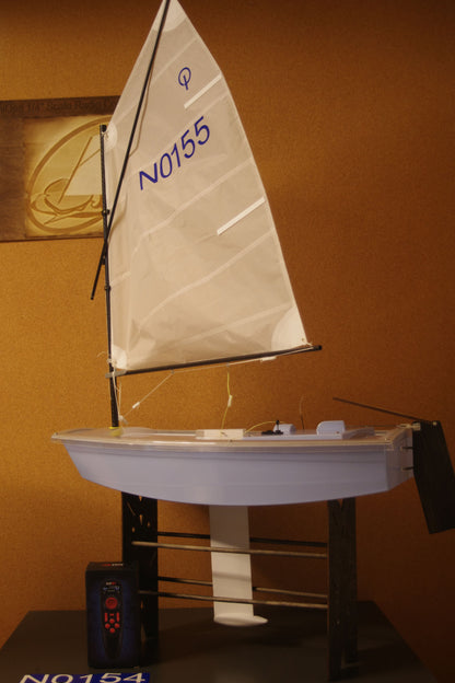 Miniopti Hull#0155 Light Blue Hull, setup & tuned complete with White Regatta sail and stand