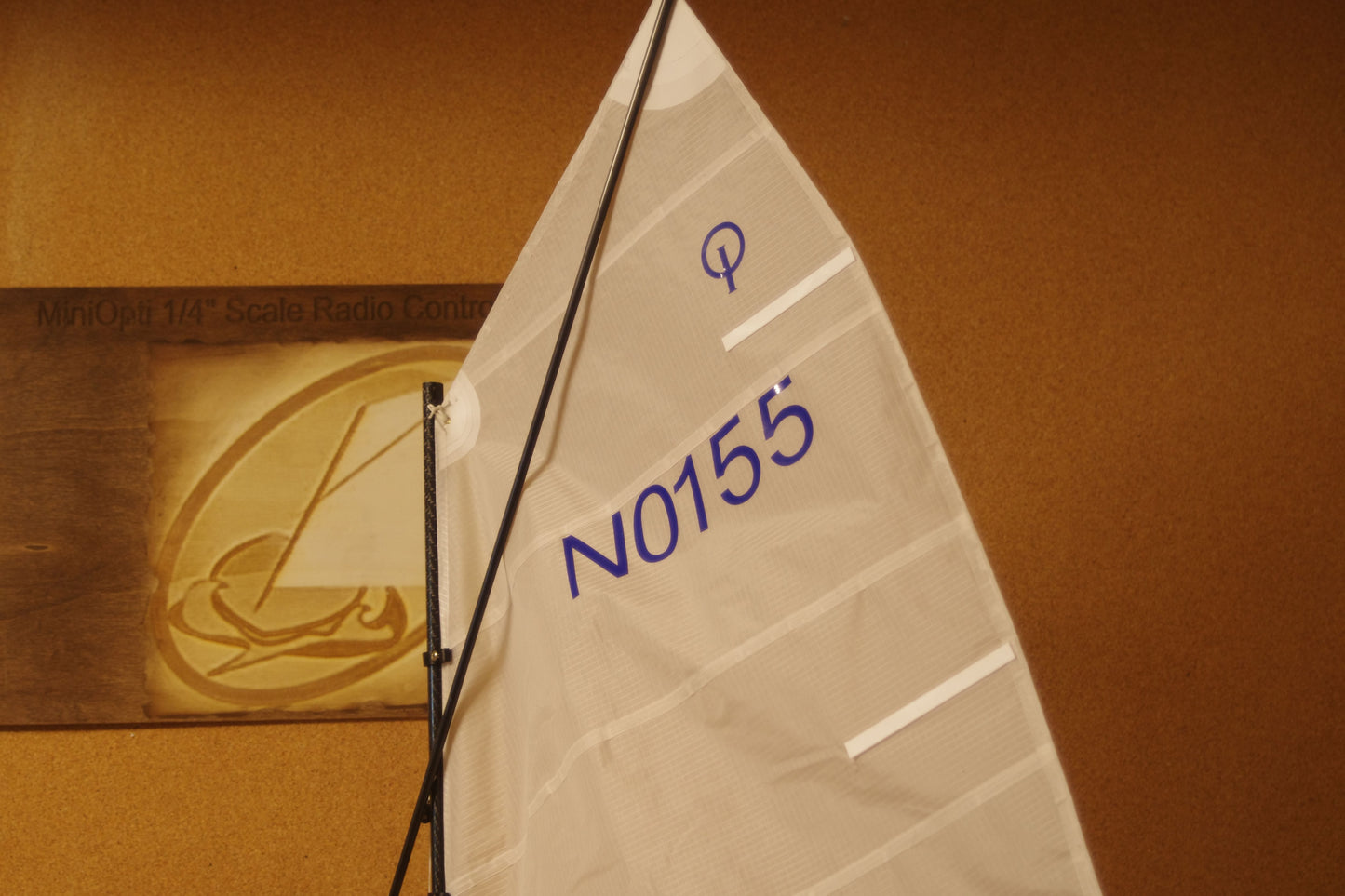 Miniopti Hull#0155 Light Blue Hull, setup & tuned complete with White Regatta sail and stand