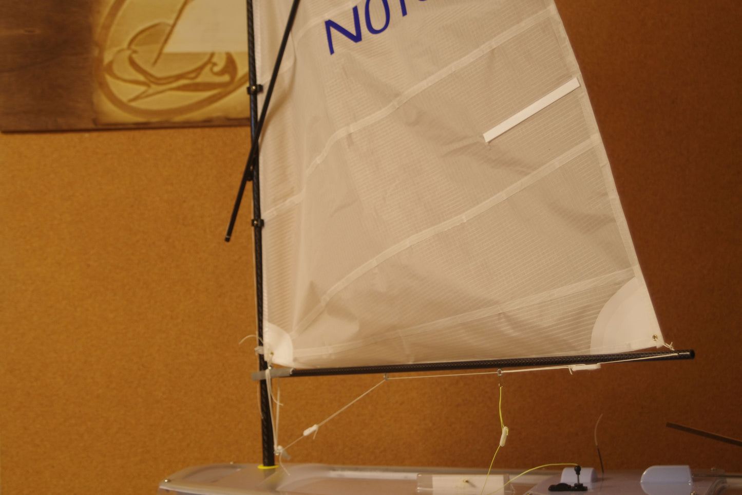 Miniopti Hull#0155 Light Blue Hull, setup & tuned complete with White Regatta sail and stand