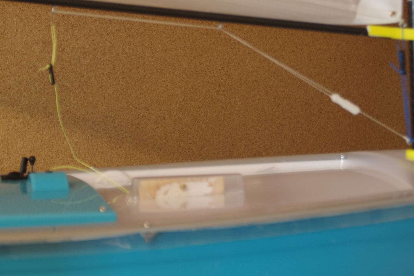 Miniopti Hull#0154 setup tuned complete with White Regatta sail and stand